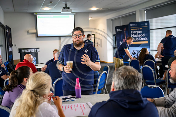 Club leaders from the West region gather for a seminar about the season ahead.