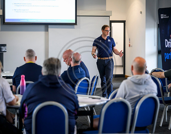 Club leaders from the West region gather for a seminar about the season ahead.
