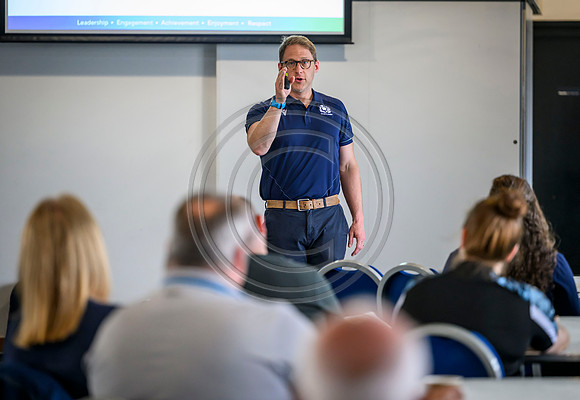 Club leaders from the West region gather for a seminar about the season ahead.