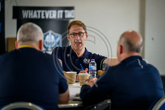 Club leaders from the West region gather for a seminar about the season ahead.